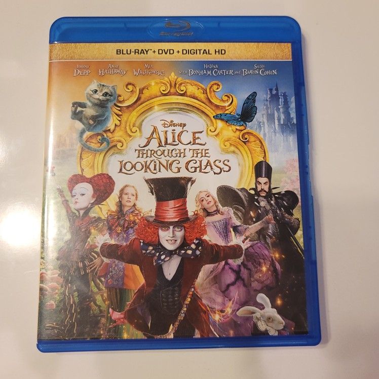 $5 BLU RAY / DVD COMBO MOVIE. DISNEY ALICE THROUGH THE LOOKING GLASS. BLU RAY / DVD ONLY. . $5 OR TRADE FOR A MOVIE TITLE I DO NOT ALREADY OWN.