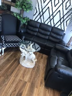 Theater black reclining couch and loveseat