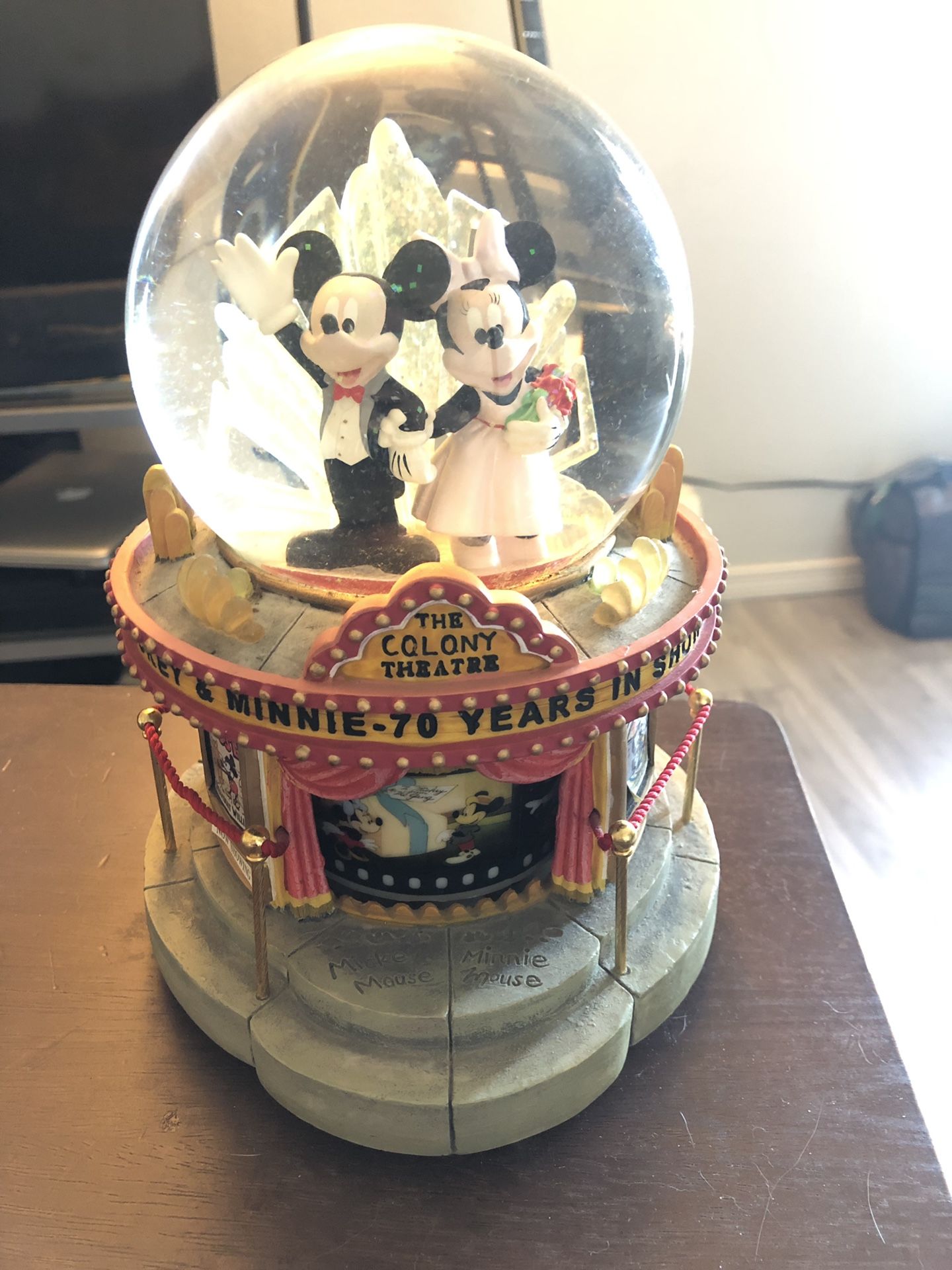 Mickey and Minnie 70 years in showbiz snow globe