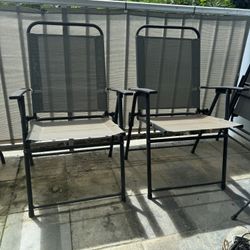 Glass patio/ Lanai Table and 4 Folding Chairs