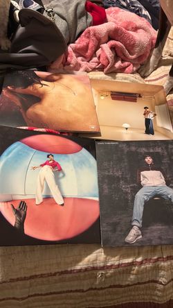 3 harry styles vinyls 1 louis tomlinson vinyl