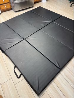 Two foldable gym mats