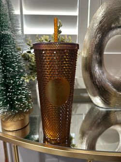 dark orange starbucks cup