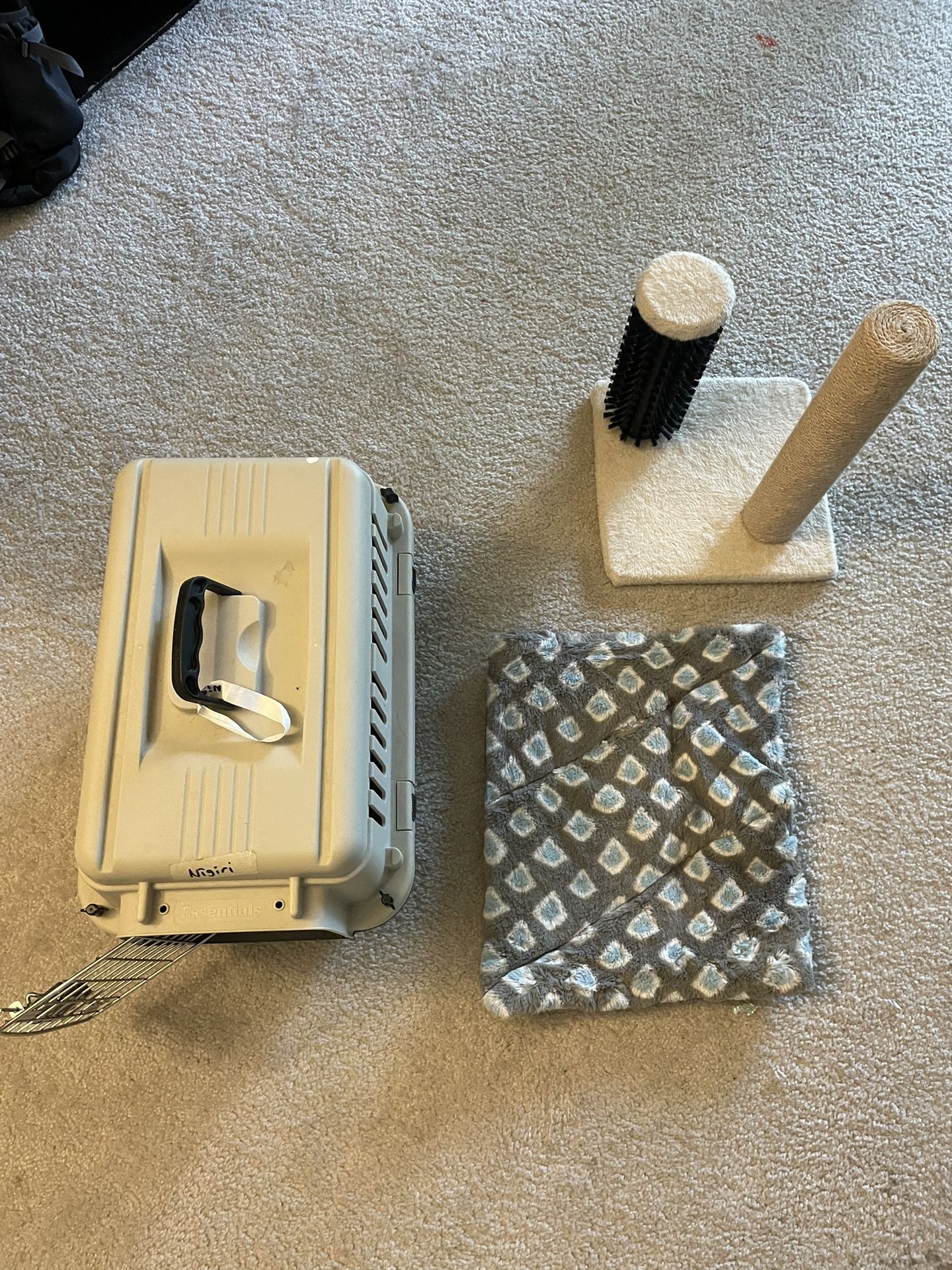 Cat kennel, bedding, and scratching post $30