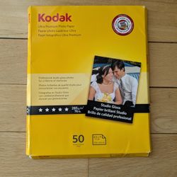 Kodak  Premium Photo Paper, 8.5 mil, Glossy, 8 1/2 x 11, 40 Sheets/Pack. 
Instant dry.
No smearing or smudging.
Works on all inkjet printers.

