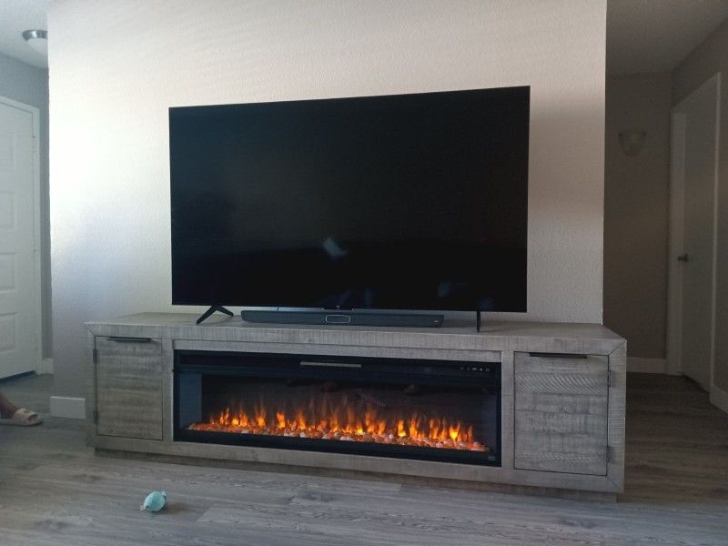 TCL TV 75 Inch Smart Tv And Fireplace Bundle Deal