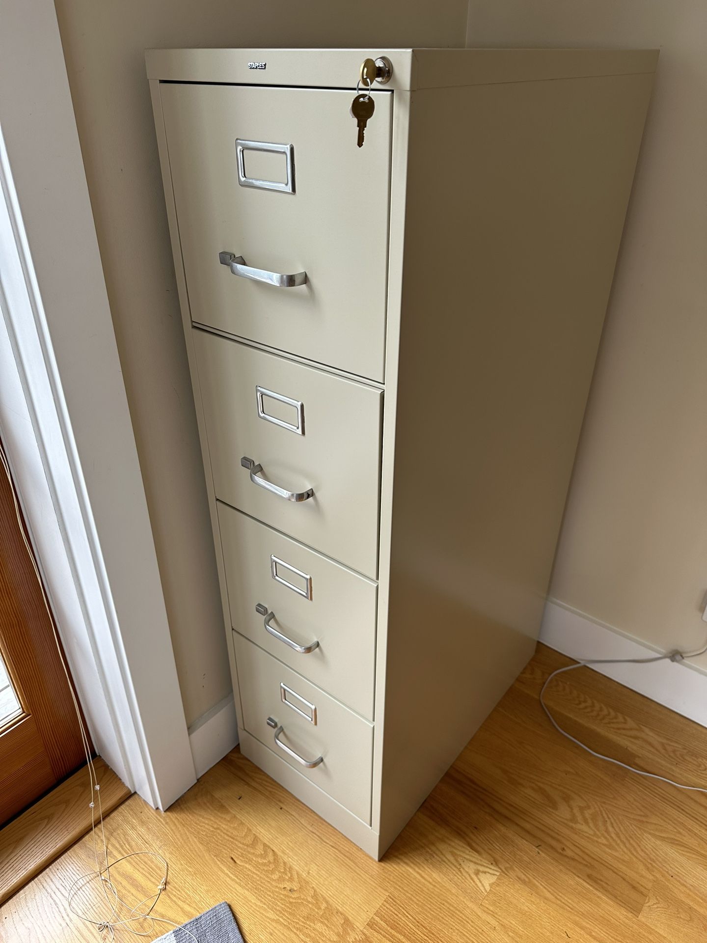 4 drawer lockable Staples  metal filing cabinet - like brand new!