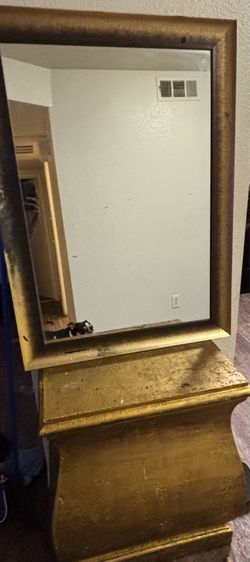 Gold bar and mirror