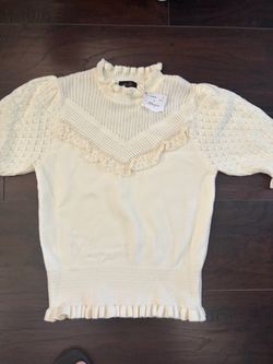 Cream Knit Sweater with Lace Ruffle Detail