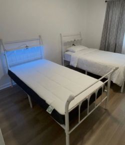 2 White Metal Twin Beds (Frames Only) - Built-in USB Ports & Shelf