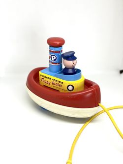 Fisher PriceVINTAGE1967 Tuggy Tooter Boat Pull Toy for Sale in