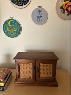 Vintage wood jewelry & music box with woven cane doors