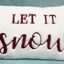 15 1/2"x24" White Soft Pillow With "Let it Snow" embroidered On It.