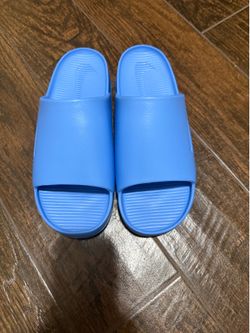 Nike light blue Calm Slides, men’s size 12.