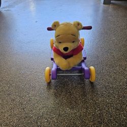 WINNIE THE POOH RIDE ON TODDLER TOY