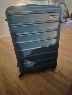 Samsonite omni 2 hardshell expandable suitcaseBrand new never used Blue Samsonite OMNI 2 Hardshell expandable suitcase