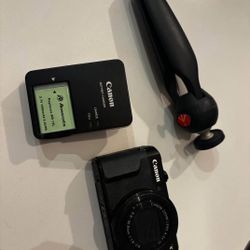 Canon G7X Camera with tripod 