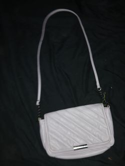 Is a little purse and its light purple