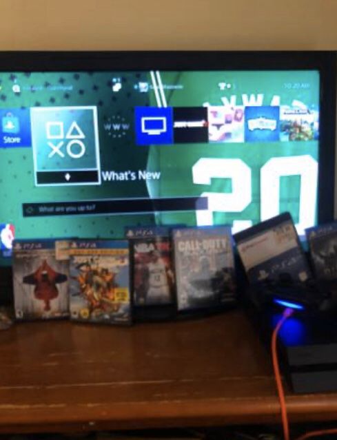 Playstation 4 + games and 32 inch TV
