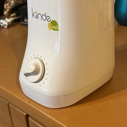 Aparato para calentar la leche de los bebés. Excelente condición