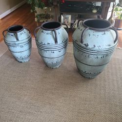 Three Metal Decorative Nesting Containers With Lids