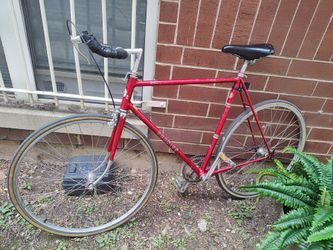 Cherry red Schwinn single speed road/ racer  w/ bullhorn/ freewheel