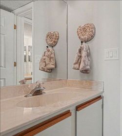 2 Separate Bathroom Vanities w. Sinks & Faucets