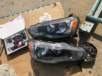 2016 Lancer ES stock headlights