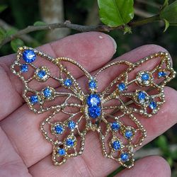 Dodds signed and vintage rhinestone very pretty blue butterfly pin or brooch goldtone in great condition. Cash pickup in New Tampa 33647. Thank you.T