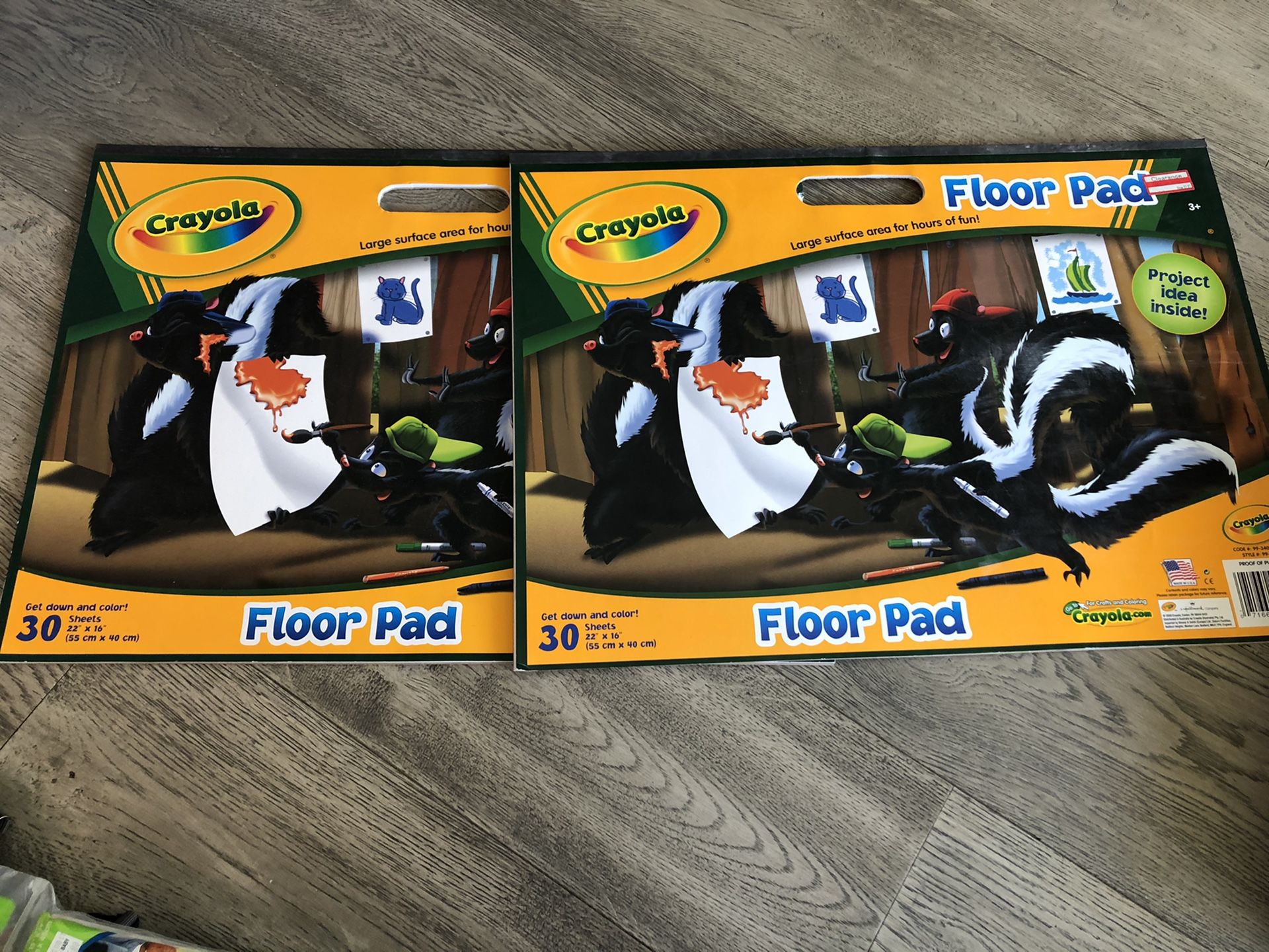 Two Crayola floor pads for free drawing