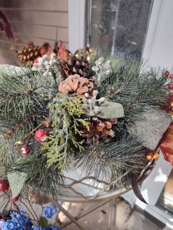 Holiday Wreath with Pinecones and Berries in ceramic planter