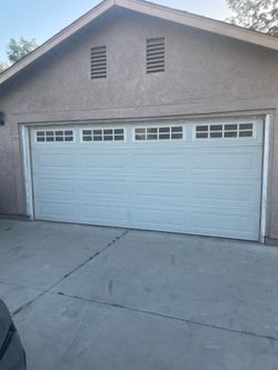 Garage door 16’x7’
