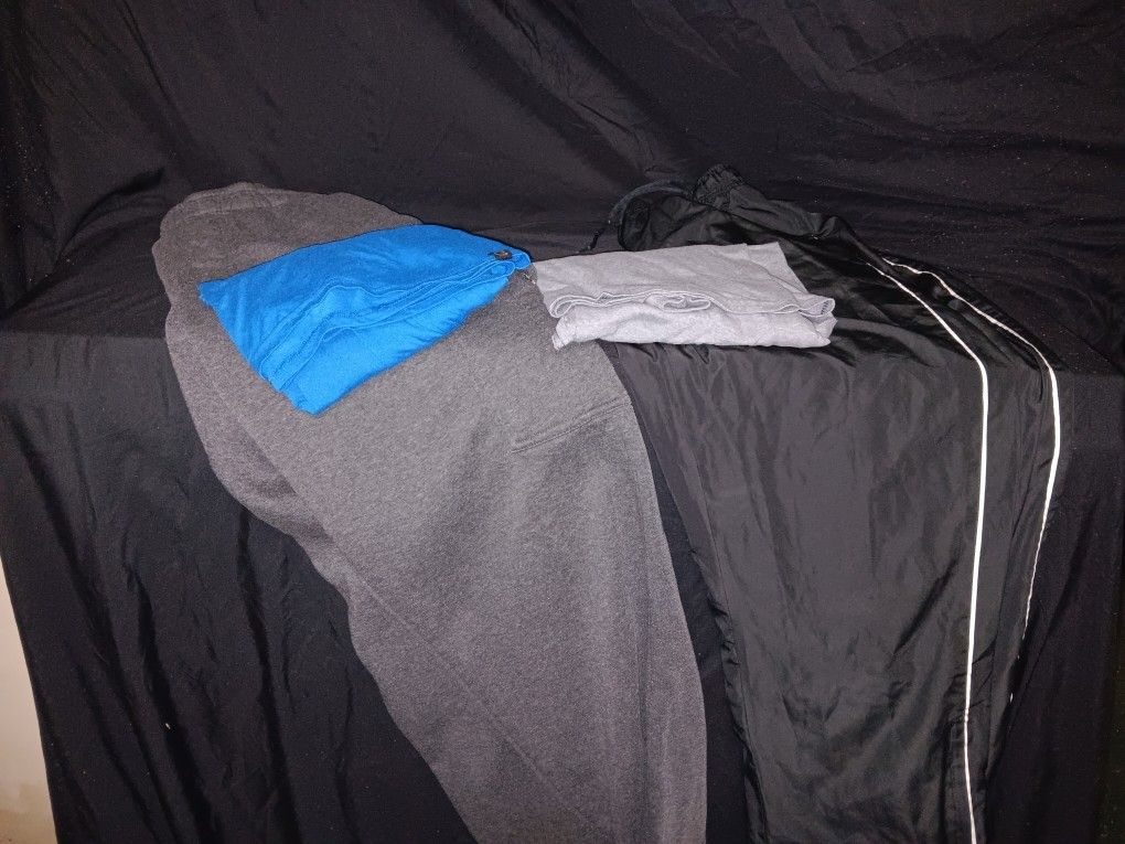Two  XL Sweatpants & Two T-SHIRTS 