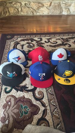 Assorted MLB and NBA hats