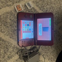 Nintendo 3DS XL  Handheld Red Gaming System With 3 Games And Charger Included