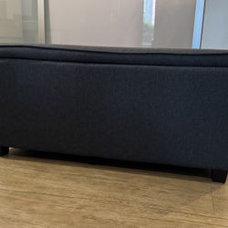 Gray Fabric ottoman. 35”wx15”dx17”h