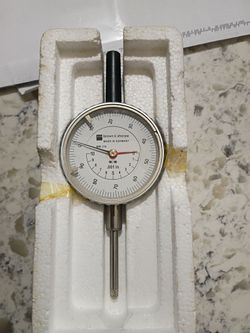 Brown and sharp dial indicator