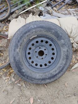 Chevy halfton wheel with tire
