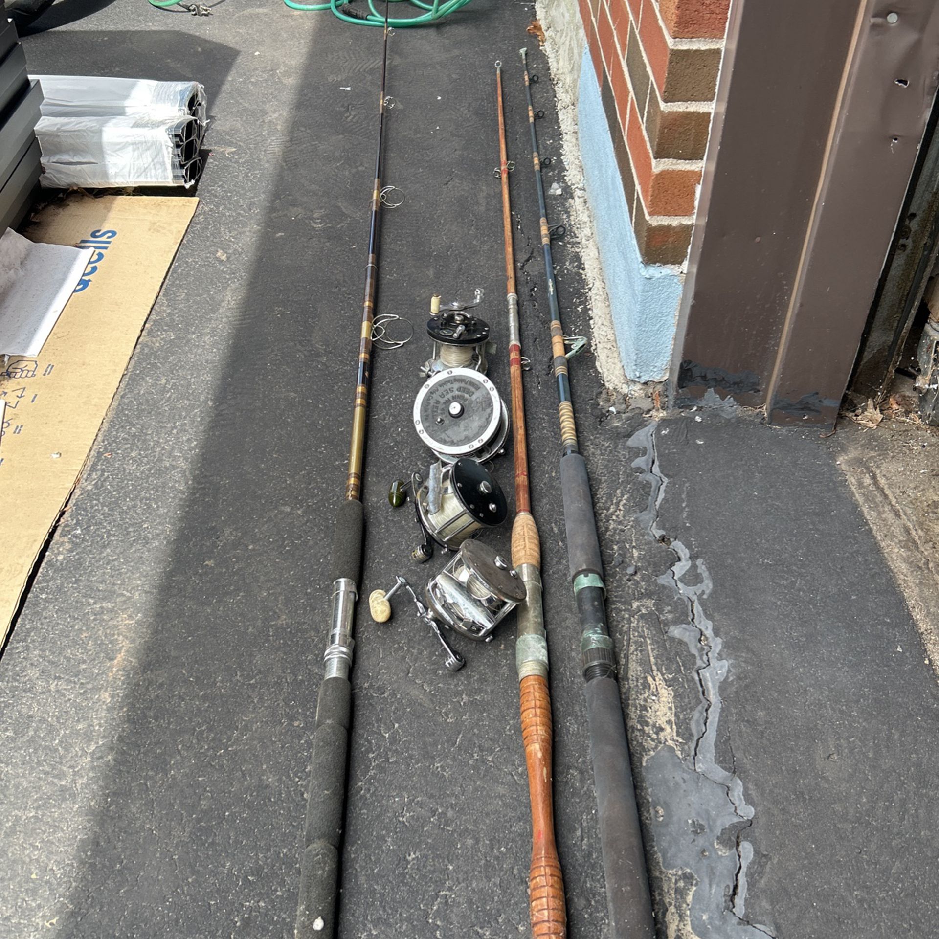 Fishing Reel And Poles 