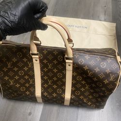 Louis Vuitton Keepall Bandoulière 55 Monogram Duffel Bag