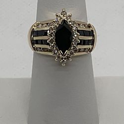 14 Kt Gold Size 7 Ring Marquis Blue Sapphire 16mm x 10mm surrounded by Halo of 18 Full Cut Diamonds 12 Channel Set Diamond & 12 Sapphires