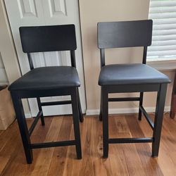 2 black Chairs