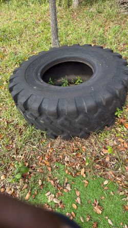 $50 Large tire about 200 pounds