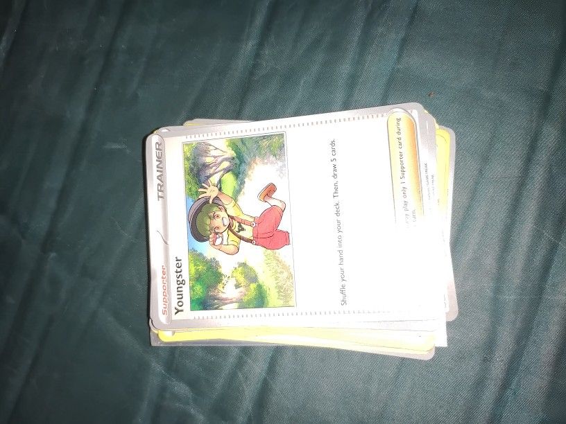 A Stack Of Trainer Cards