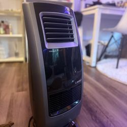Lasko tower portable heater fan in black and gray. Features motion heat technology. Ready for the winter time.