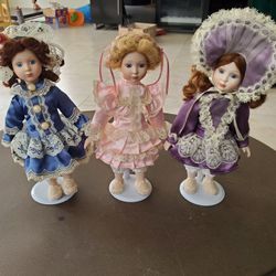 11 -NEW 5" Tall Porcelain Dolls On Stands $5 Each