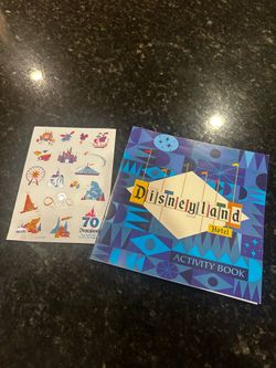 Rare Disneyland hotel activity book and rare 70th sticker sheet