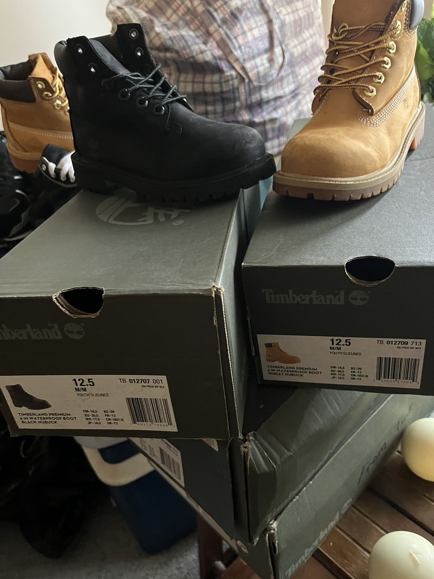 2 pairs Black & Gold Timberlands Boots..Little kids.. Size 12.5 $70 each.. Both for $120.00 very good condition..👇🏽👇🏽