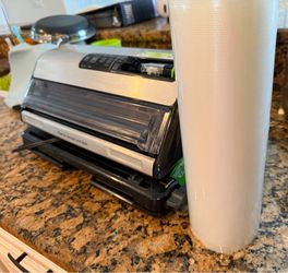 Vacuum Sealer and Roll of Bags