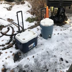 Two Large Coolers On Wheels With Pull Up Handles